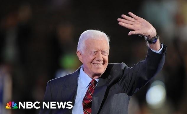 Jimmy Carter podpisuje porozumienia z Camp David, Begin, Sadat.